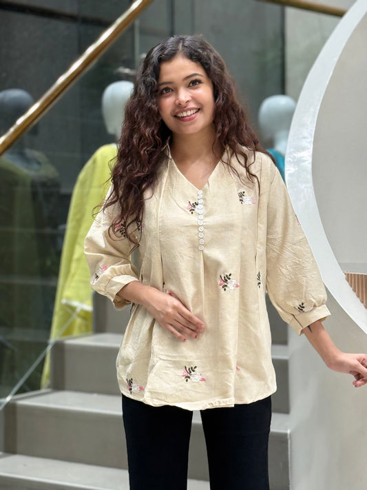 Embroidered top with button detail