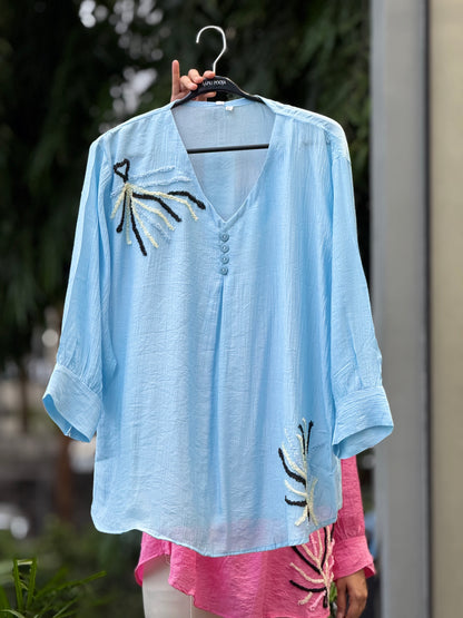 embroidered button detail top.