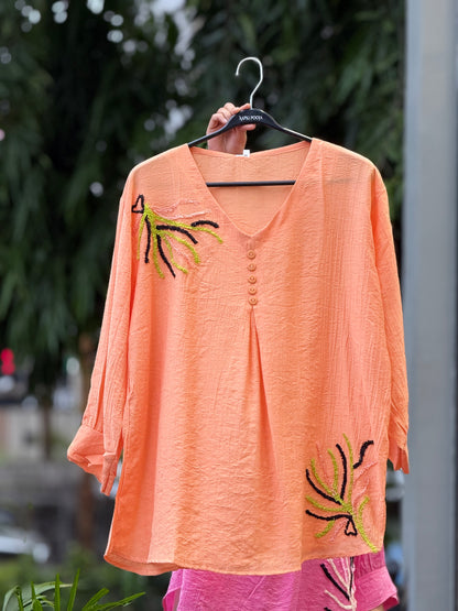 embroidered button detail top.