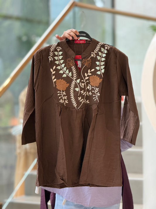 Neckline embroidered top