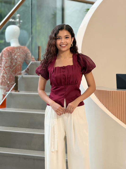 Partywear top with puff sleeves
