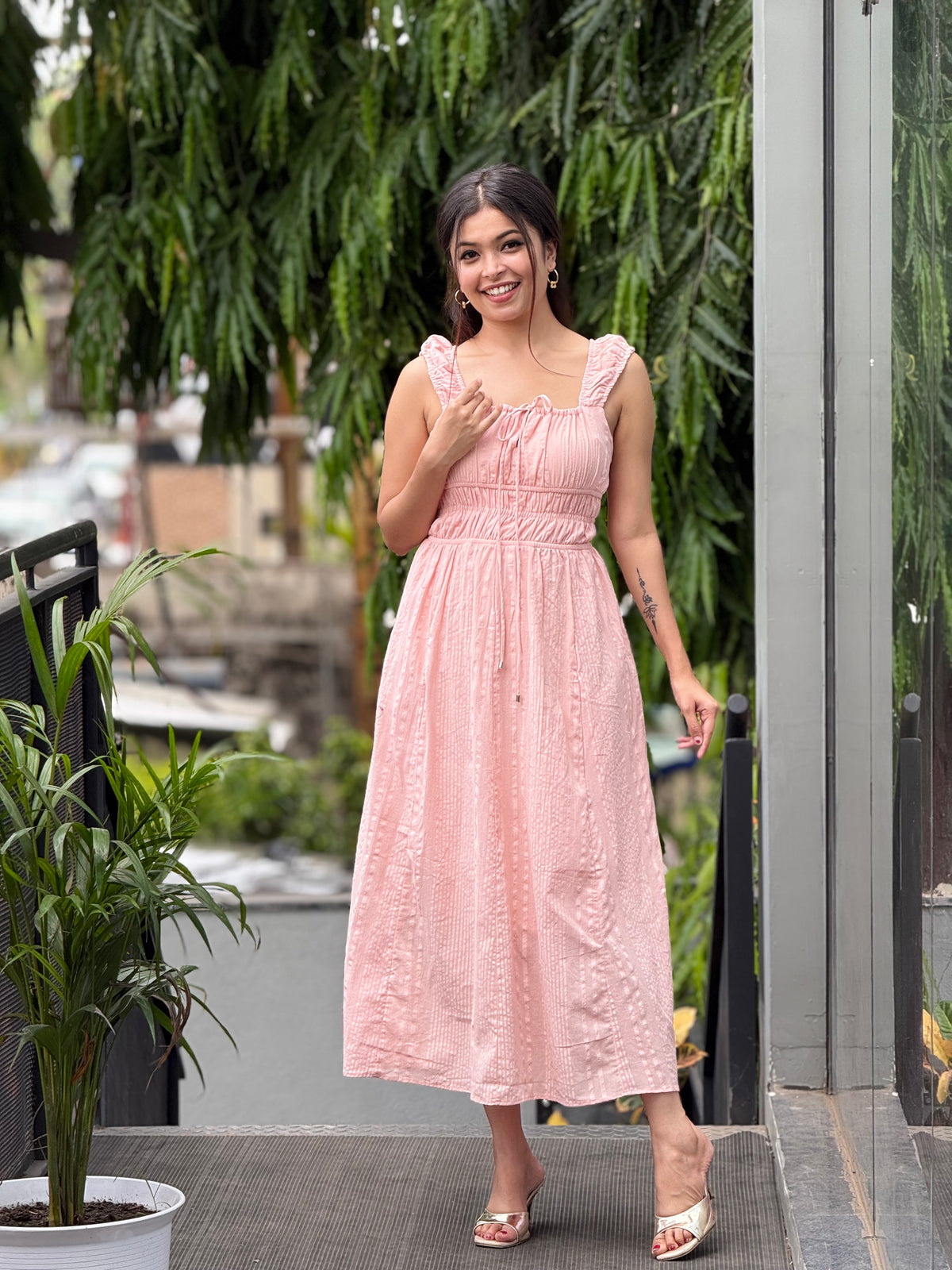 Pink one piece dress with strap back